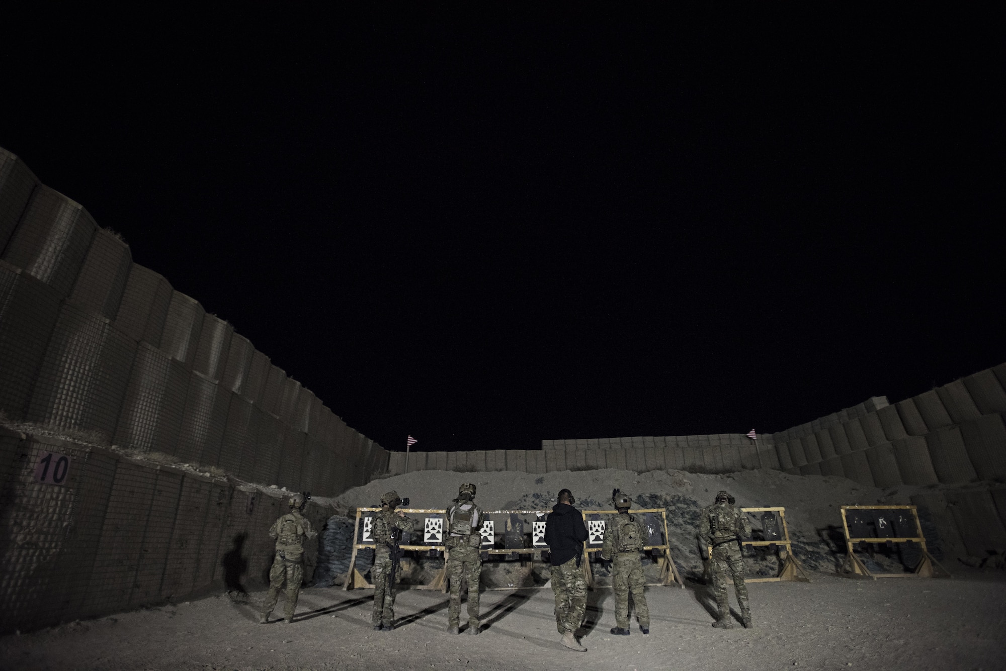 Pararescuemen of the 83rd Expeditionary Rescue Squadron prepare to begin night firing drills Nov. 18, 2016 at Bagram Airfield, Afghanistan. Some of the 83rd ERQS’s Guardian Angels are seasoned veterans, while others are experiencing their first deployment. Training opportunities such as these allow veterans to pass on their experiences from multiple deployments. (U.S. Air Force photo by Staff Sgt. Katherine Spessa)