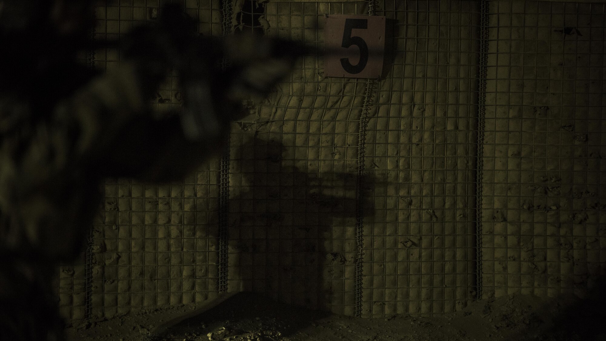 An 83rd Expeditionary Rescue Squadron pararescueman, fires an M-4 Carbine rifle during night firing drills Nov. 18, 2016 at Bagram Airfield, Afghanistan. Pararescuemen, often referred to as “Guardian Angels” are tasked with recovery and medical treatment of personnel in any type of environment. Those deployed to Bagram are responsible for combat rescue missions within the Afghan theater.  (U.S. Air Force photo by Staff Sgt. Katherine Spessa)

