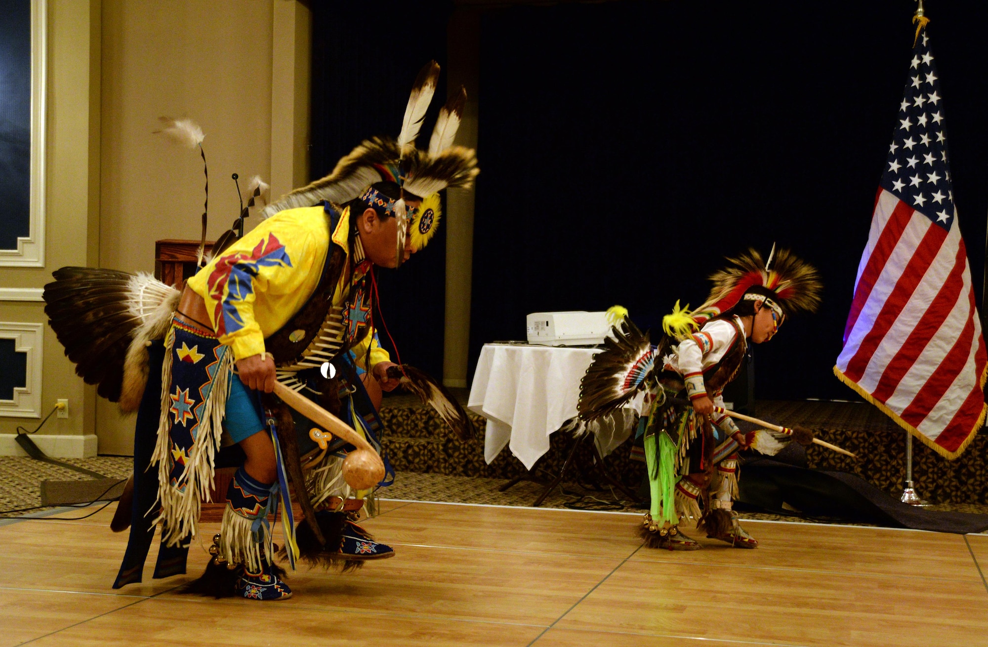 Dustin Lovejoy, Culture Club Sponsor for the Omaha Nation Public Schools, and his son perform traditional National American Indian dances during the Offutt Diversity Team’s National American Indian Heritage Month event Nov. 15 at the Patriot Club. This year’s theme, selected by Defense Equal Opportunity Management Institute, was “Serving our Nations,” a tribute to the 567 federally recognized tribes across the U.S. (U.S. Air Force photo/Josh Plueger)