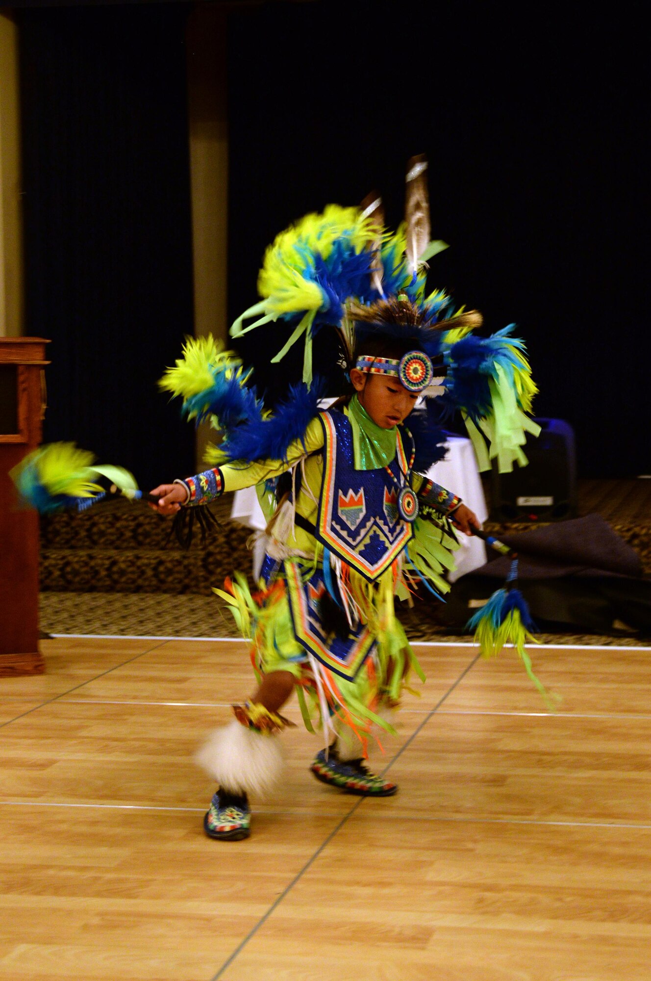 Kane Sheridan, 6, performs traditional National American Indian dances during the Offutt Diversity Team’s National American Indian Heritage Month event Nov. 15 at the Patriot Club. As the headlining act, the Omaha Tribe brought 34 members, ranging from elementary to high school students, teachers, parents and elders. (U.S. Air Force photo/Josh Plueger)