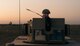 Senior Airman Anthony Wachob, a member of the 821st Contingency Response Group, radios in from a defensive fighting position while on perimeter watch at Qayyarah West Airfield, Iraq, Nov. 17, 2016. The 821st CRG is highly specialized in training and rapidly deploying personnel to quickly open airfields and establish, expand, sustain and coordinate air mobility operations in austere, bare-base conditions. (U.S. Air Force photo/Senior Airman Jordan Castelan)