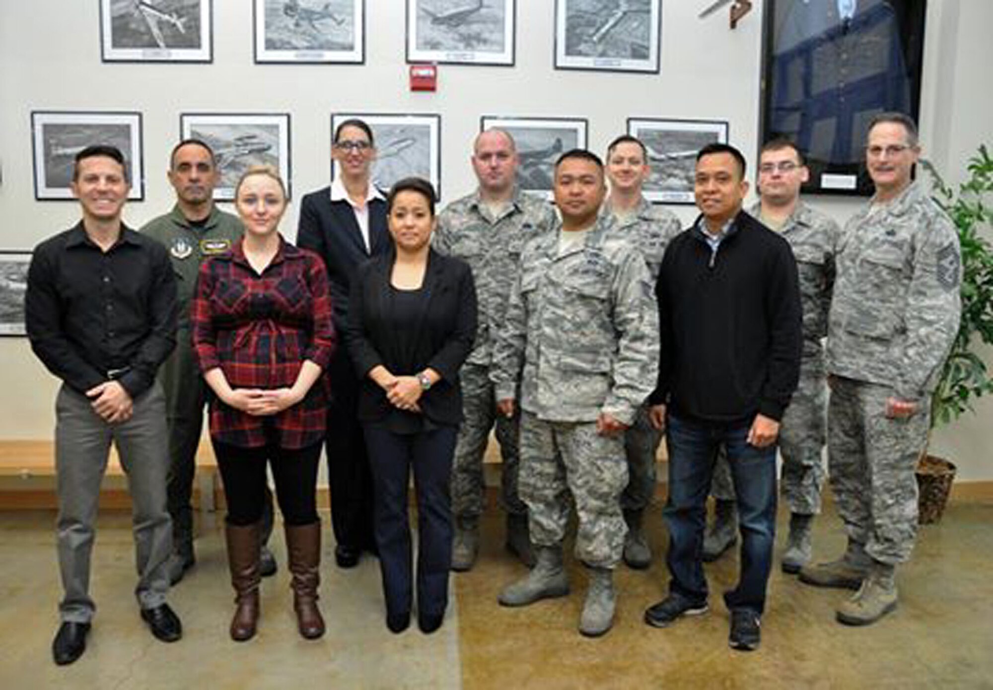 Chief Master Sgt. Bryan Payne (far right), 349th Air Mobility Wing command chief master sergeant, welcomed the unit's newest group of reservists during the B-Flight Unit Training Assembly, November 19, 2016.