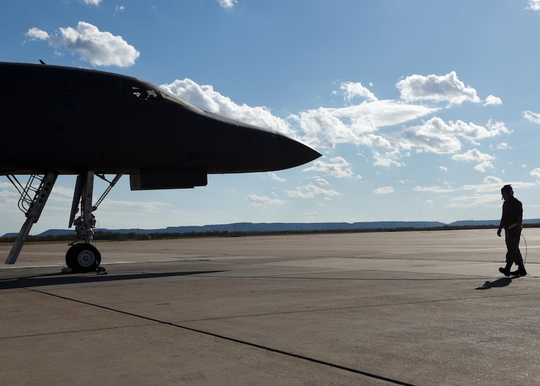 U.S. Air Force Staff Sgt. Kevin Khanthavongsay, 489th Maintenance Squadron B-1B Lancer crew chief, prepares B-1 pilots for takeoff at Dyess Air Force Base, Nov. 22, 2016. As a former active-duty Airmen, Khanthavongsay has the experience to contribute to the newly activated 489th Bomb Group. The 489th Airmen’s expertise is part of what made the 489th MXS successful in maintaining 100% of B-1 sorties with no maintenance issues. (U.S. Air Force photo by Senior Airman Kedesha Pennant)