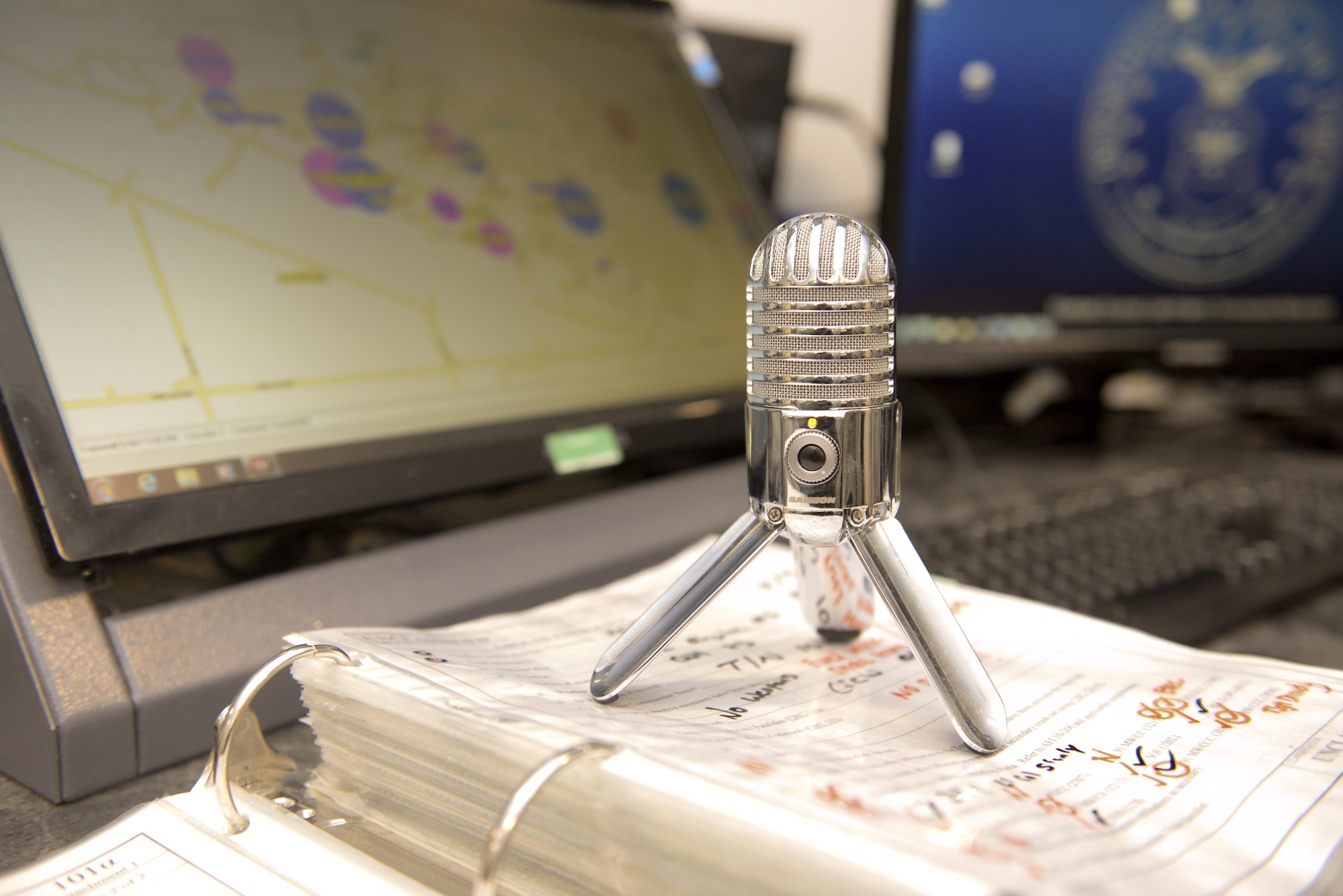 The microphone for the WeatherWarn System sits on a desk in the 5th Bomb Wing command post at Minot Air Force Base, N.D., Nov. 16, 2016. Controllers provide local data, such as, weather notifications and immediate response actions, to wing personnel to ensure they understand and knows their role during an emergency situation. (U.S. Air Force photo/Airman 1st Class Jessica Weissman)