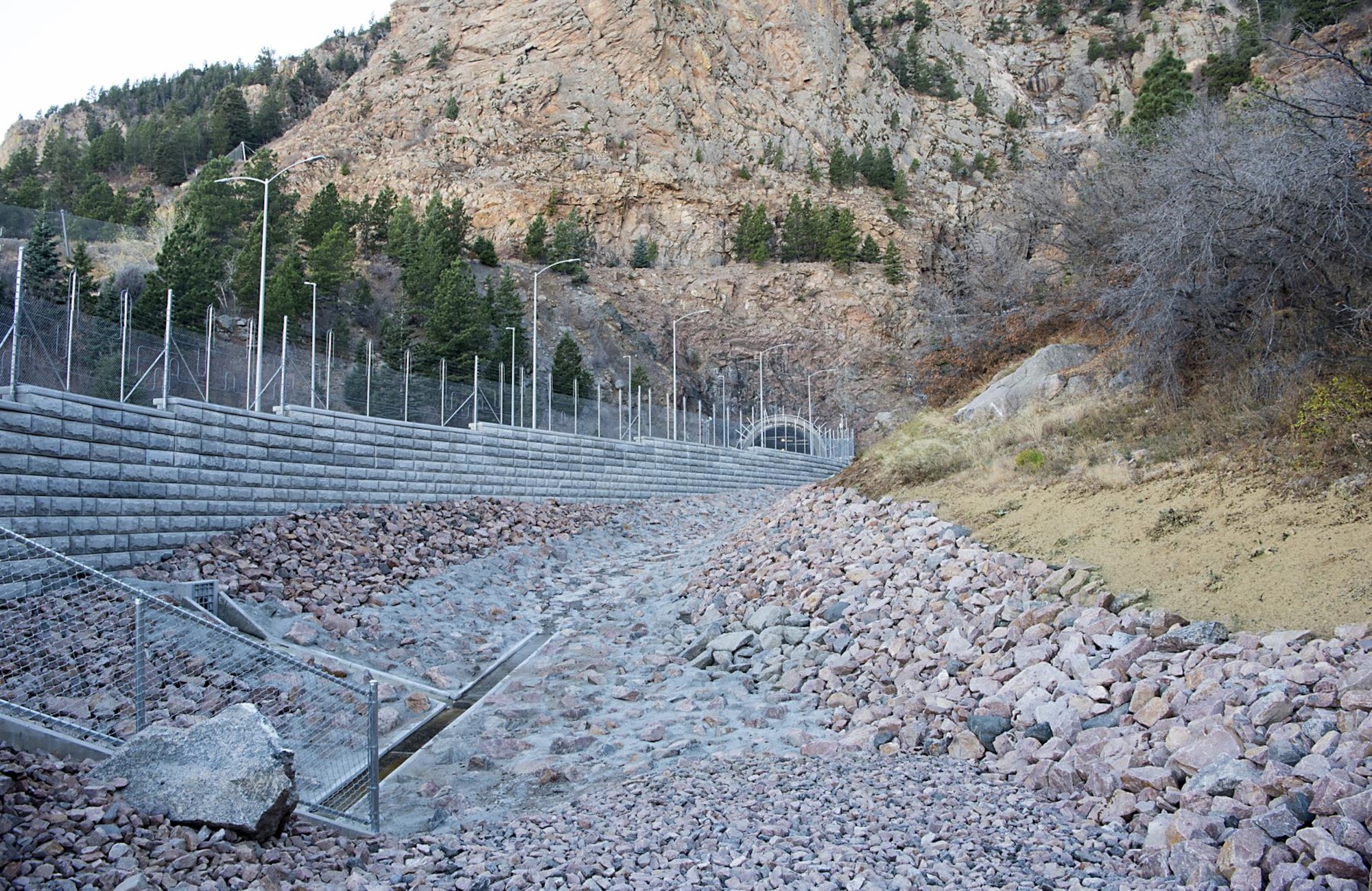 CHEYENNE MOUNTAIN AIR FORCE STATION, Colo. – Cheyenne Mountain Air Force Station completed repairs to the North Portal on Nov. 16, 2016. The project included a 9,300 cubic yard catch basin that will capture overflow mud and small debris away from the road and North Portal. (U.S. Air Force photo by Steve Kotecki)