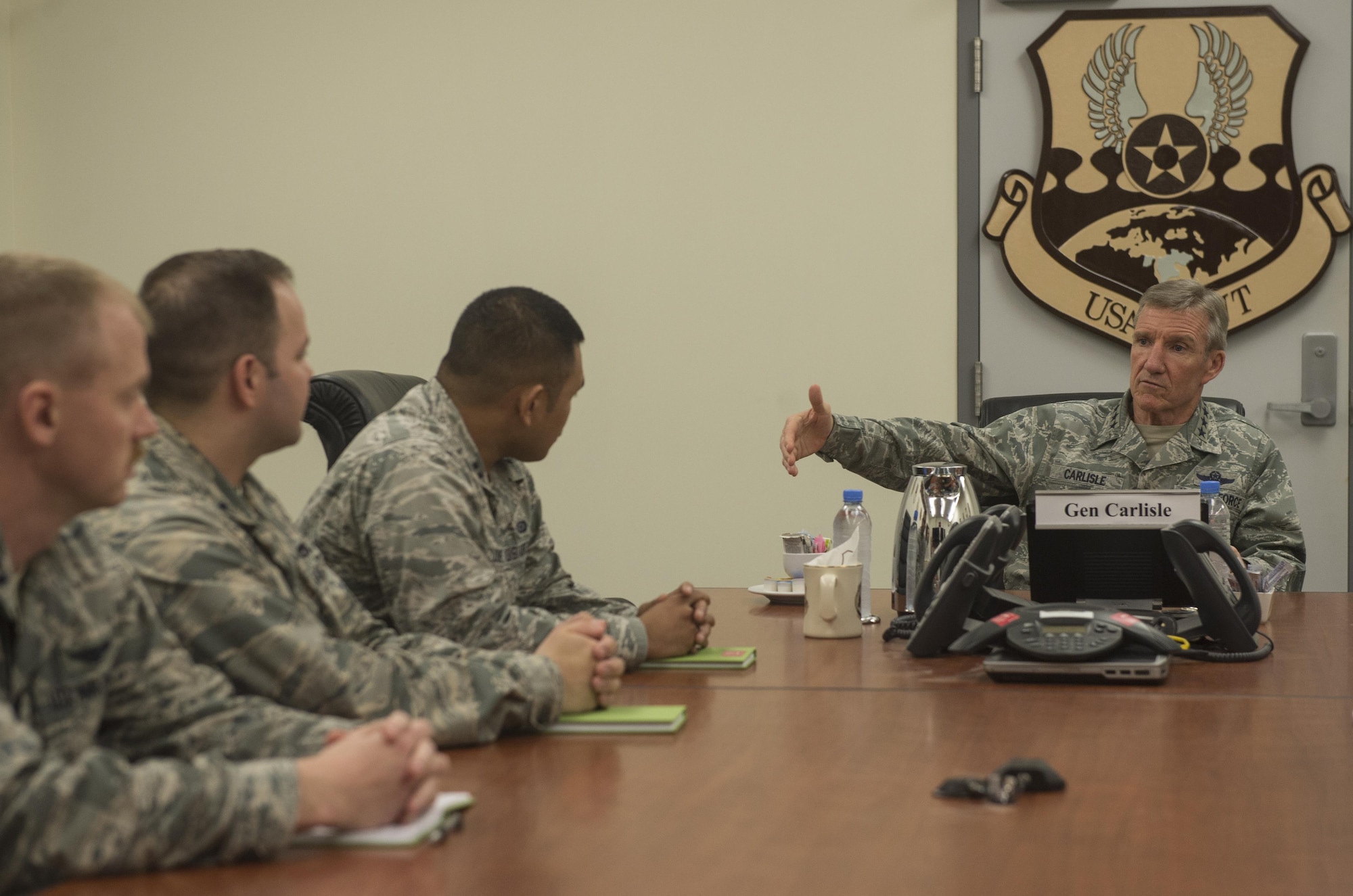 Gen. Hawk Carlisle, commander of Air Combat Command, talks with company-grade officers deployed to Al Udeid Air Base, Qatar, during a mentoring session Nov. 21, 2016. Carlisle traveled to various bases in the U.S. Air Forces Central Command to visit with Airmen and address their concerns. (U.S. Air Force photo by Staff Sgt. Matthew B. Fredericks)