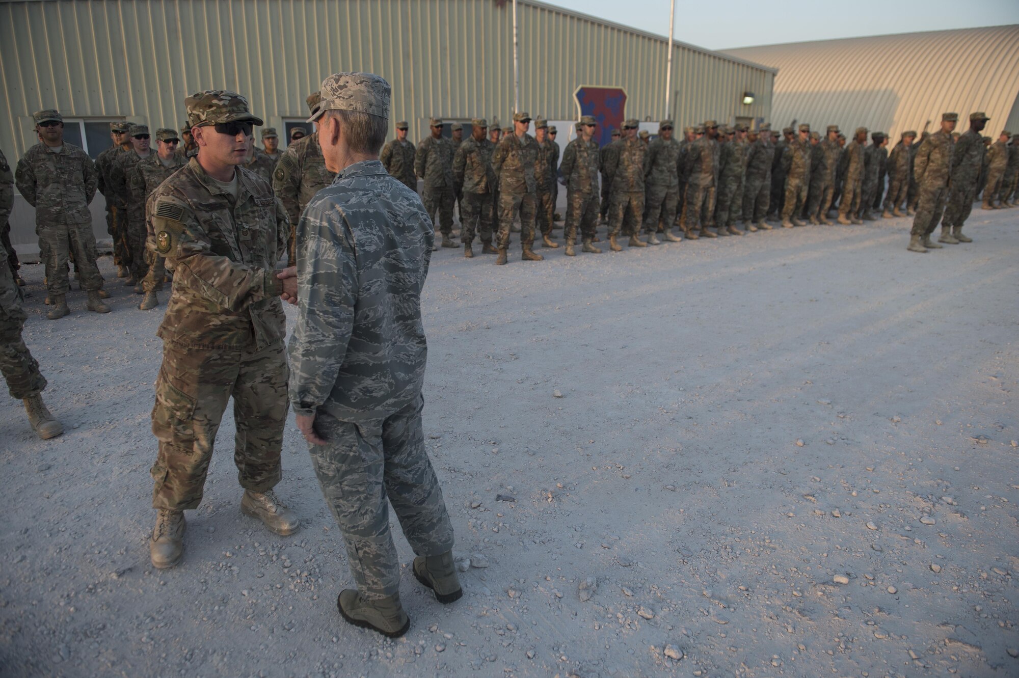 Gen. Hawk Carlisle, commander of Air Combat Command, talks with Tech. Sgt. James Frye, 577th Prime BEEF Squadron, about the capabilities of his squadron during a visit Nov. 21, 2016 at Al Udeid Air Base, Qatar. Carlisle is visiting bases in the U.S. Central Command area of responsibility to engage with Airmen and thank them for their service. (U.S. Air Force photo by Staff Sgt. Matthew B. Fredericks)
