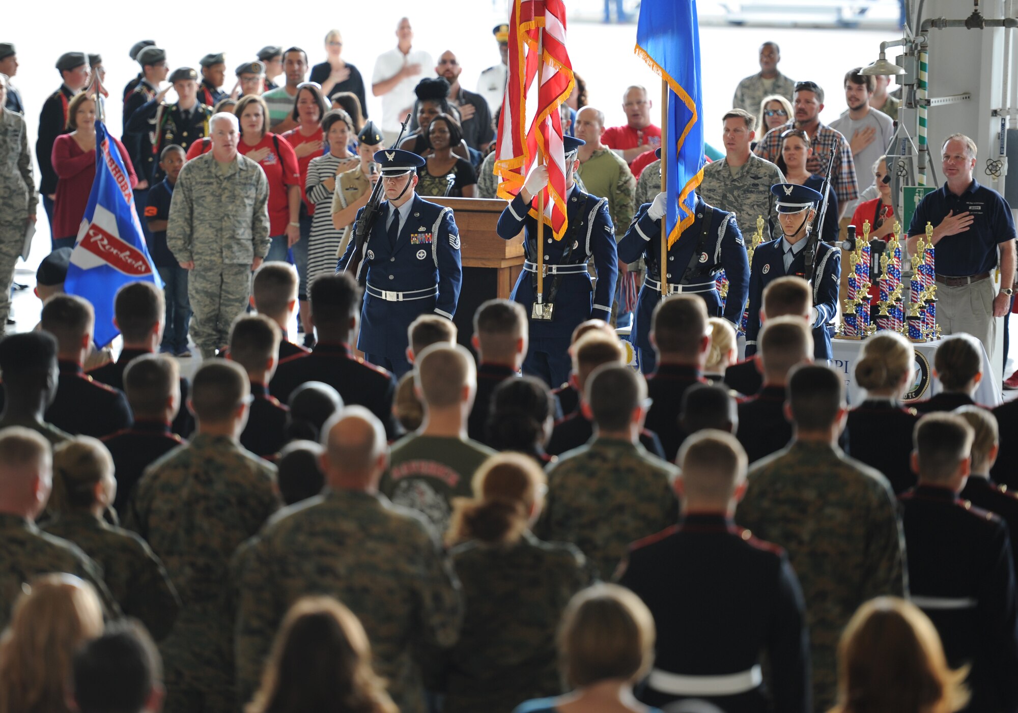 The Keesler Honor Guard posts the colors during the pledge of allegiance during the Third Annual Mississippi All-Services Junior ROTC Drill Competition Nov. 18, 2016, on Keesler Air Force Base, Miss. More than 500 Junior ROTC cadets, spectators and volunteers were in attendance where cadets battled for the best all-services Junior ROTC team in Mississippi. Seventeen Junior ROTC teams from all military branches were represented at the event with the Biloxi High School Air Force Junior ROTC earning the top honors. (U.S. Air Force photo by Kemberly Groue)