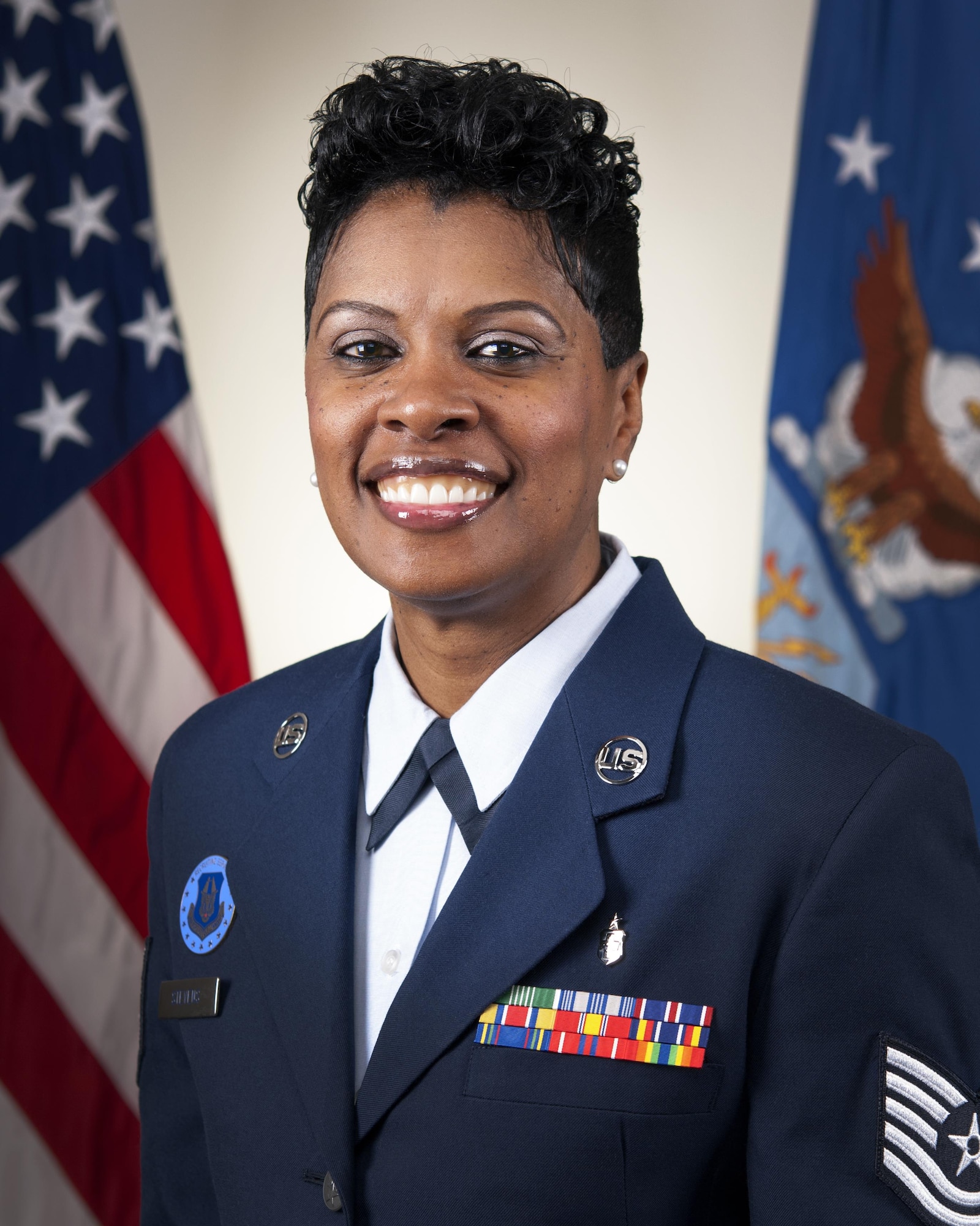 Tech. Sgt. Sharon Stevens, 434th Aerospace Medical Squadron dental assistant, poses for an official photo at Grissom Air Reserve Base, Ind., Oct. 2, 2016. Stevens recently accepted a job as an Air Force Reserve recruiter. (U.S. Air Force photo/Tech. Sgt. Benjamin Mota)