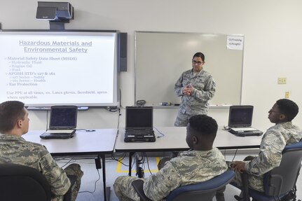 U.S. Air Force Staff Sgt. Kristian Grajales, 373rd Training Squadron Detachment 5 initial skills training instructor, teaches hazardous materials and environmental safety to students Nov. 22, 2016, at joint Base Charleston, South Carolina. The 373rd TRS Det. 5 is responsible for C-17 Globemaster III initial skills crew chief training (Type 3), Advanced skills technical training (Type 4), International training, the only U.S. Air Force C-17 Trainer Development Team for crew chiefs. 