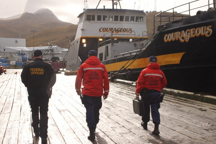 In this file photo, NOAA OLE Officer Roy Fisher, Ensign Nolan Salyer and Petty Officer 3rd Class Thomas Labarre, a maritime enforcement specialist, conduct joint agency boarding of the fishing vessel Courageous that previously served as the Coast Guard buoy tender Tupelo before being decommissioned, in Dutch Harbor, Alaska, Oct. 28, 2016. The Morgenthau conducted a 90-day 15,000 mile patrol in support of fisheries enforcement and served as a search and rescue asset during the busy Alaska fishing seasons. 
