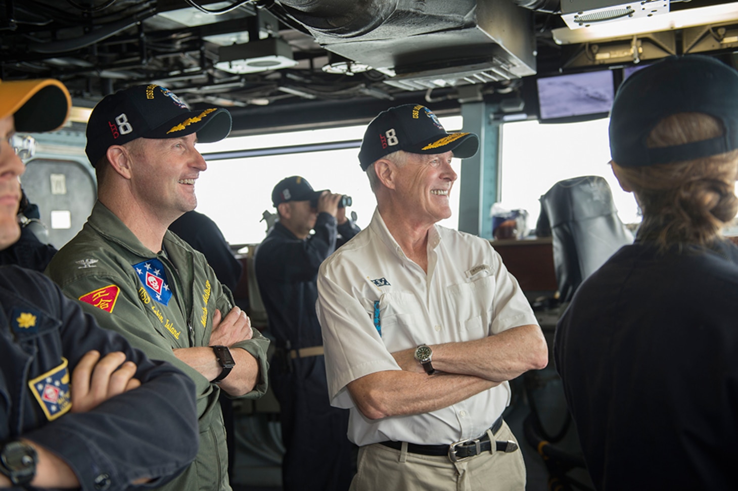 Secretary of the Navy (SECNAV), the Honorable Ray Mabus, right, and USS Makin Island (LHD 8) Commanding Officer Capt. Mark A. Melson observe Makin Island’s Strait of Malacca transit from the bridge after the ship’s departure from Changi Naval Base, Singapore.  Mabus was aboard Makin Island as part of a visit to the Pacific and Central Command areas of responsibility to meet with Sailors, Marines, and military and government officials. Makin Island, the flagship of the Makin Island Amphibious Ready Group, is operating in the U.S. 7th Fleet area of operations with the embarked 11th Marine Expeditionary Unit in support of security and stability in the Indo-Asia-Pacific region.
