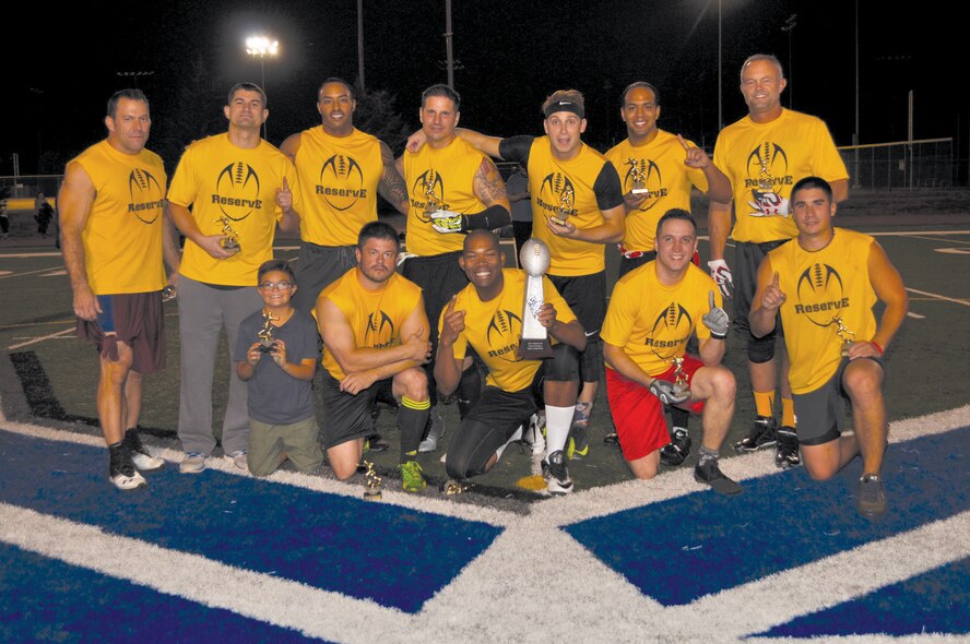 Reserve Gold players enjoy their victory Nov. 15 over the 552nd Maintenance Squadron. They won the base intramural football championship 23-6. Team members are, from left, front row, (MVP) Carson Conner, Jim Sherman, Jay Harris, Brian VanCuren and Jacob Bacon. Back row, from left, are Ken Sarsycki, Michael Rosenthal, Floyd Conner, James Gasaway, Brett Nims, Gregory Shepherd and Chad Van Winkle. Team members also included Jeremy Allen, Juston Curry, Reginald Davis, Adrian Mack and Denzel Neal. (Air Force photo by John Parker)