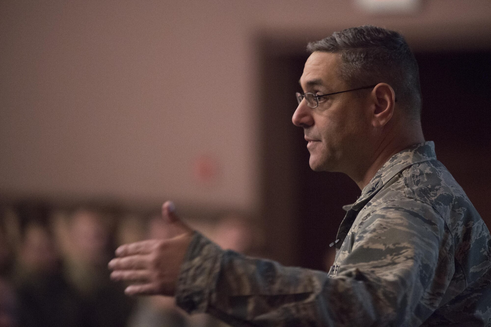 Col. Stephen Kravitsky, 90th Missile Wing commander, speaks during an all-call at F.E. Warren Air Force Base, Wyo., Nov. 22, 2016. During the all-call, Kravitsky had a wing safety representative remind Airmen to be safe driving during inclement winter weather and to provide holiday safety tips. (U.S. Air Force photo by Staff Sgt. Christopher Ruano)