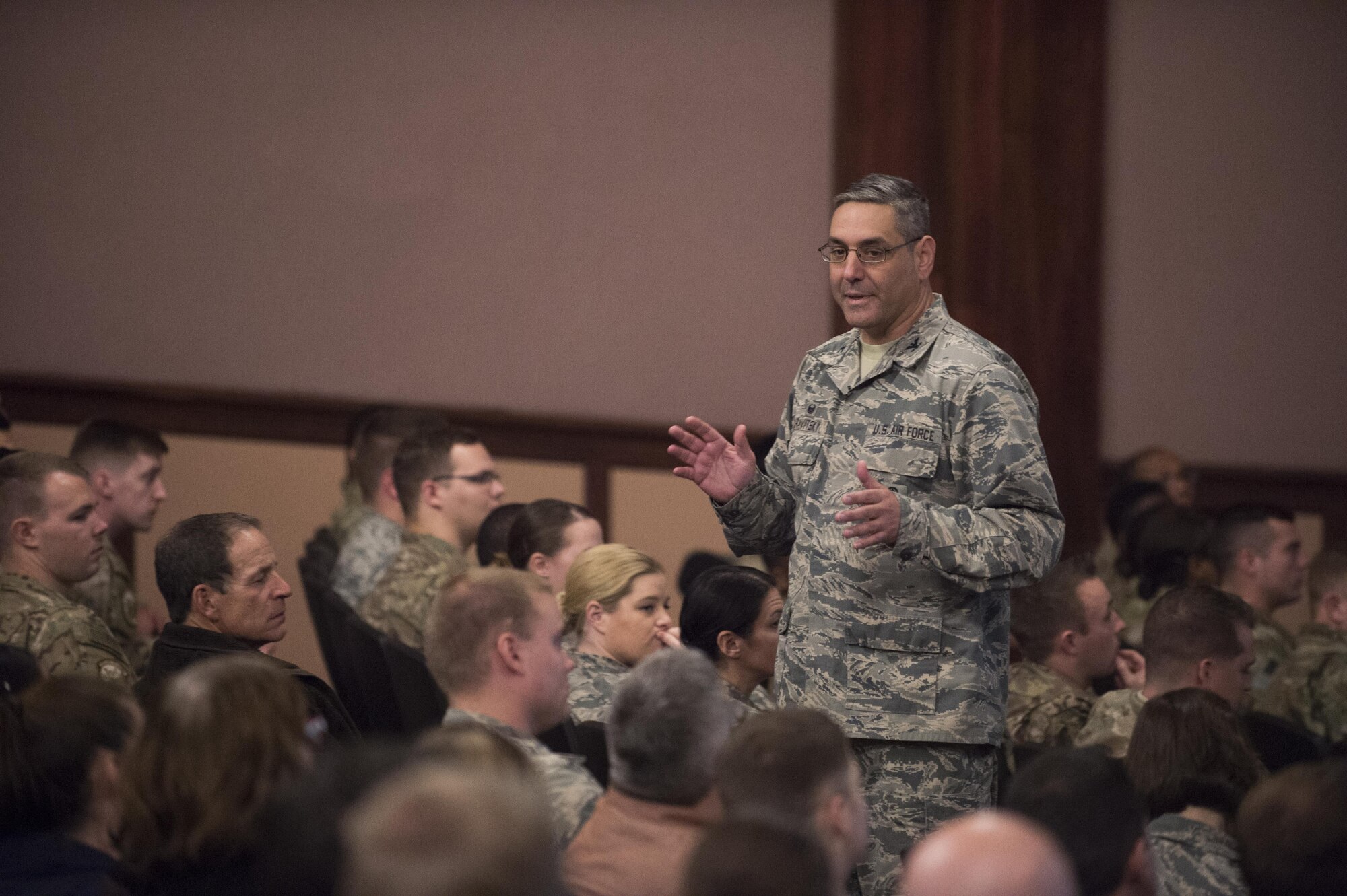 Col. Stephen Kravitsky, 90th Missile Wing commander, speaks during an all-call at F.E. Warren Air Force Base, Wyo., Nov. 22, 2016. Kravitsky spoke about the results of the recent Unit Effectiveness inspection, thanking the Airmen for their hard work at improving the wing. (U.S. Air Force photo by Staff Sgt. Christopher Ruano)