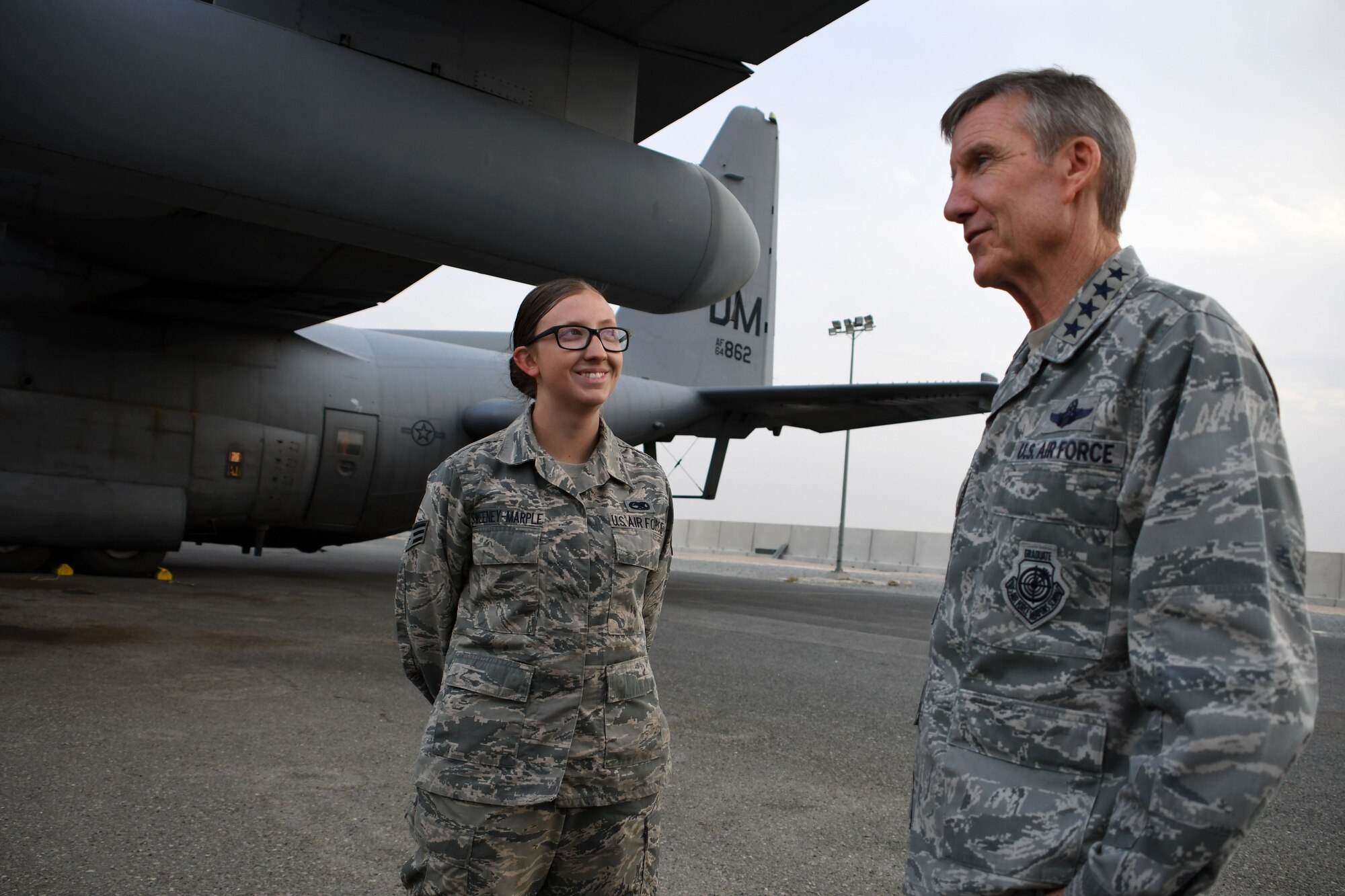 U.S. Air Force Gen. Hawk Carlisle, commander of Air Combat Command, talks with Senior Airman Colleen Sweeney-Marple, 386th Expeditionary Aircraft Maintenance Squadron assistant dedicated crew chief, Nov. 23, 2016 at an undisclosed location in Southwest Asia. During his visit, Carlisle praised the wing’s efforts providing airlift; electronic warfare; and intelligence, surveillance and reconnaissance capabilities in the fight against the Islamic State of Iraq and the Levant. (U.S. Air Force photo/Senior Airman Andrew Park)