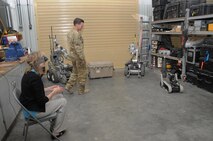 Mrs. Gillian Carlisle, wife of U.S. Air Force Gen. Hawk Carlisle, commander of Air Combat Command, controls an explosive ordinance disposal robot at the 386th Expeditionary Civil Engineer Squadron EOD flight building facility at an undisclosed location in Southwest Asia Nov. 23, 2016.  Mrs. Carlisle toured base EOD facilities to learn about the mission the unit performs in the U.S. Central Command area of responsibility. (U.S. Air Force photo/Tech. Sgt. Kenneth McCann)