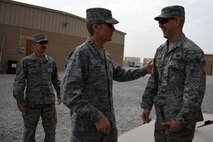 U.S. Air Force Gen. Hawk Carlisle, commander of Air Combat Command, talks with an Airman after his all call Nov. 23, 2016 at an undisclosed location in Southwest Asia. Carlisle stressed to the 386th Air Expeditionary Wing’s Airmen that they were the Air Force’s most valuable asset. (U.S. Air Force photo/Senior Airman Andrew Park)