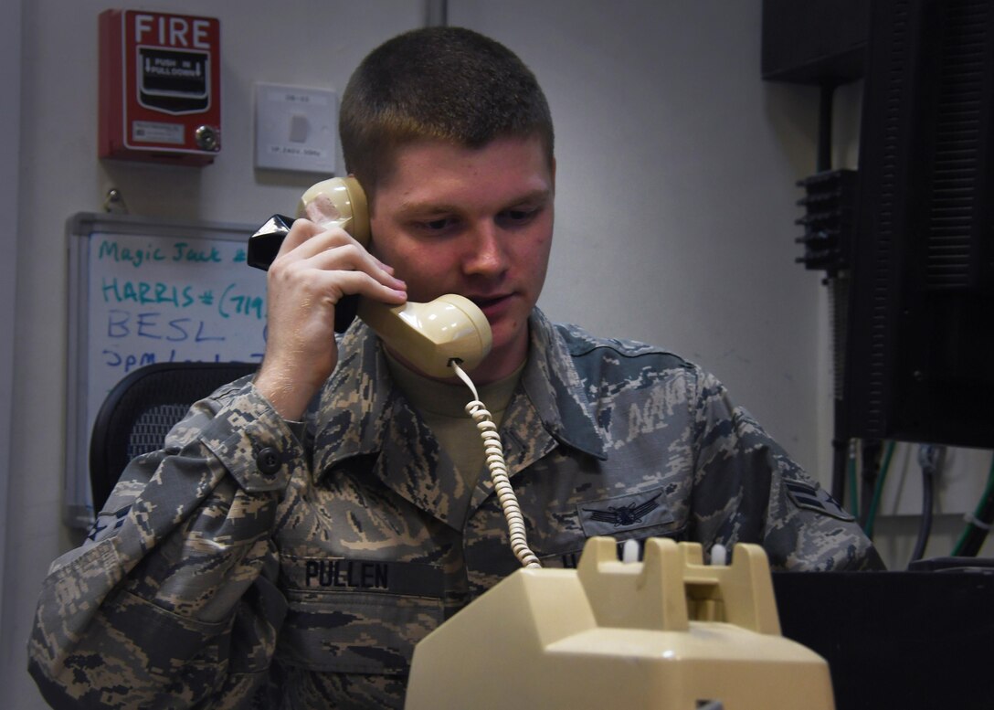 Air Force Airman 1st Class Jake Pullen, a space control operator with the 379th Expeditionary Operations Support Squadron, receives a phone call from Defense Secretary Ash Carter on Thanksgiving, Nov. 24, 2016. Pullen is deployed to the U.S. Central Command area of responsibility where he supports Operation Silent Sentry, which monitors and helps to protect U.S. satellite communications assets. Air Force photo by Senior Airman Miles Wilson
