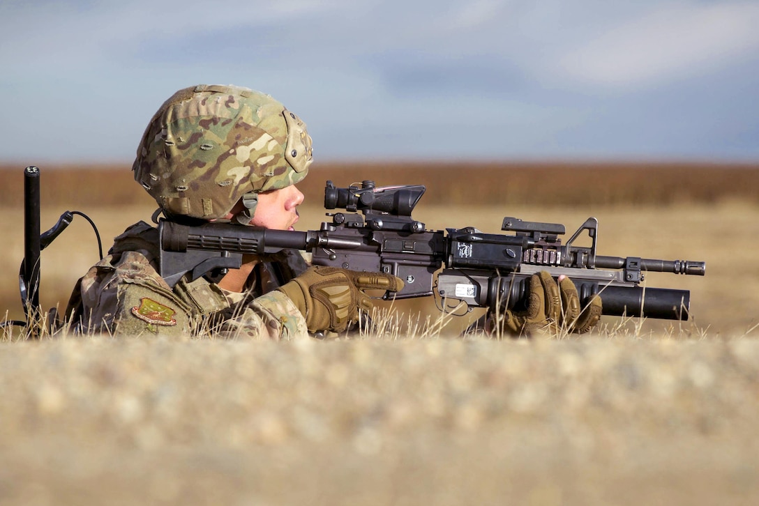 Air Force Senior Airman Brandon Thompson provides security during a recapture and recovery exercise at The Missile Complex, N.D., Nov. 16, 2016. Defenders set up a security perimeter during the exercise to watch for hostile forces. Air Force photo by Senior Airman Apryl Hall
