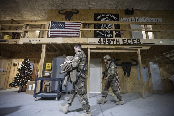 Force protection sentries from the 455th Expeditionary Civil Engineer Squadron head out to work on Thanksgiving, Nov. 24, 2016 at Bagram Airfield, Afghanistan. While many squadrons allowed their members to celebrate Thanksgiving while deployed, the mission did not stop. (U.S. Air Force photo by Staff Sgt. Katherine Spessa)