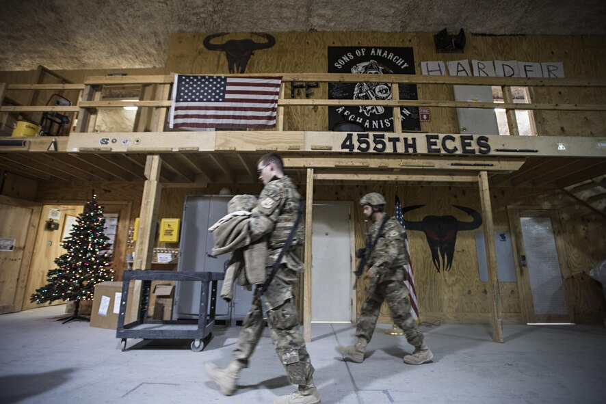 Force protection sentries from the 455th Expeditionary Civil Engineer Squadron head out to work on Thanksgiving, Nov. 24, 2016 at Bagram Airfield, Afghanistan. While many squadrons allowed their members to celebrate Thanksgiving while deployed, the mission did not stop. (U.S. Air Force photo by Staff Sgt. Katherine Spessa)