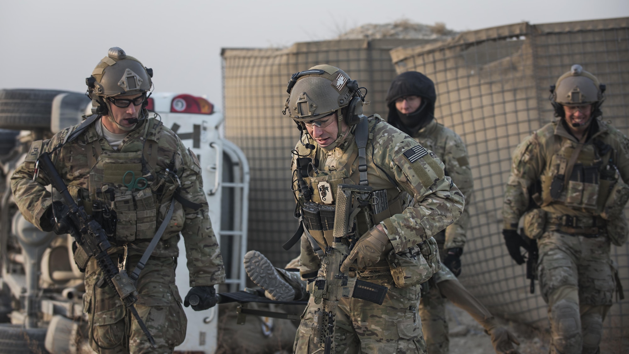 “Guardian Angels” of the 83rd Expeditionary Rescue Squadron carry a patient by litter for evacuation during a mass casualty exercise held Nov. 17, 2016 at Bagram Airfield, Afghanistan. Training scenarios are based on real-world situations that have been encountered in past operations. (U.S. Air Force photo by Staff Sgt. Katherine Spessa)