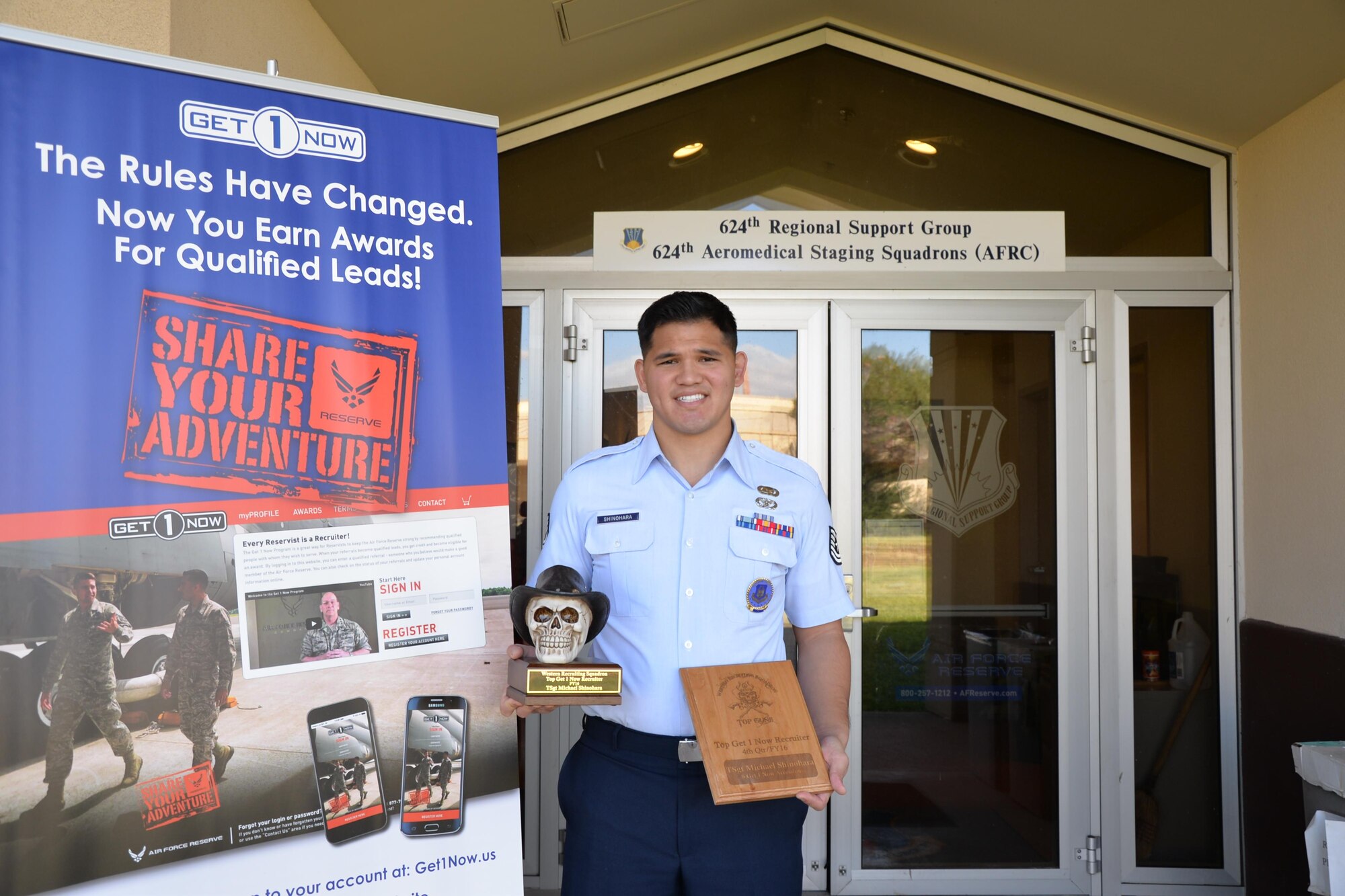 Tech. Sgt. Michael Shinohara, an Air Force Reserve recruiter based out of Joint Base Pearl Harbor-Hickam, Hawaii and a Yigo, Guam native, showcases the awards he was presented at the Air Force Reserve Command Recruiting Service Deployment Readiness Training, in Orlando, Florida, Oct. 26, 2016. He earned the Western Recruiting Squadron Top Get 1 Now Recruiter award for having the most fiscal year 2016 accessions through the Get 1 Now Program. Shinohara also earned the Top Get 1 Now Recruiter for the fourth quarter, for having eight accessions. Located on Oahu and Guam, and a component of the Air Force Reserve, the 624th Regional Support Group's mission is to deliver mission essential capability through combat readiness, quality management and peacetime deployments in the Pacific area of responsibility. (U.S. Air Force photo by Master Sgt. Theanne Herrmann) 