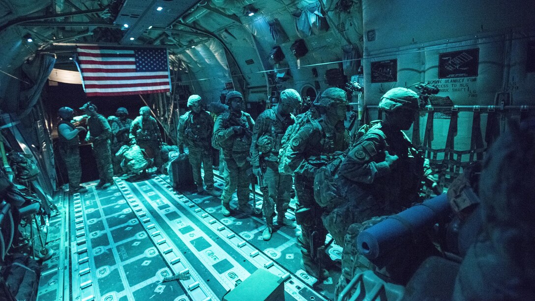 Members of the 10th Special Forces Group load onto a C-130J Hercules belonging to the 774th Expeditionary Airlift Squadron at Farah Airfield, Afghanistan Nov. 10, 2016. The 774th EAS uses the unique versatility of the C-130 to supplement tactical airlift capabilities in and out of austere locations under atypical conditions. (U.S. Air Force photo by Staff Sgt. Katherine Spessa)