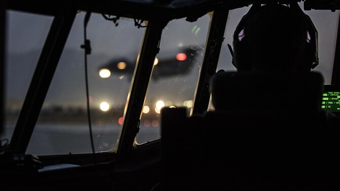 Capt. Nick Bonner, 774th Expeditionary Airlift Squadron C-130J Hercules pilot prepares to take off from Bagram Airfield, Afghanistan Nov. 10, 2016. The high pressure altitude, extreme temperature disparity and rugged terrain of Afghanistan make for a challenging environment to fly in. (U.S. Air Force photo by Staff Sgt. Katherine Spessa)