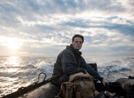 A U.S. Air Force Airman from the 320th Special Tactics Squadron maneuvers a Zodiak sea vessel through the Pacific Ocean, Nov. 22, 2016, off of the western of Okinawa, Japan. The 320th STS uses a variety of vehicles and methods of transportation to complete their training and mission objectives. (U.S. Air Force photo by Senior Airman Omari Bernard/Released)