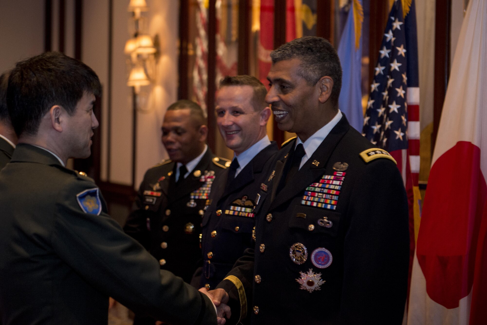 U.S. Army Gen. Vincent K. Brooks, United Nations Command commander, greets guests to the United Nations Day 71st Anniversary Celebration in Tokyo, Japan, Nov. 21, 2016. Attendees included ambassadors, diplomats, members of Ministry of Foreign Affairs and Ministry of Defense of Japan, Japan Self-Defense Forces and United States Forces, Japan senior military officers. (U.S. Air Force photo by Airman 1st Class Donald Hudson/Released)