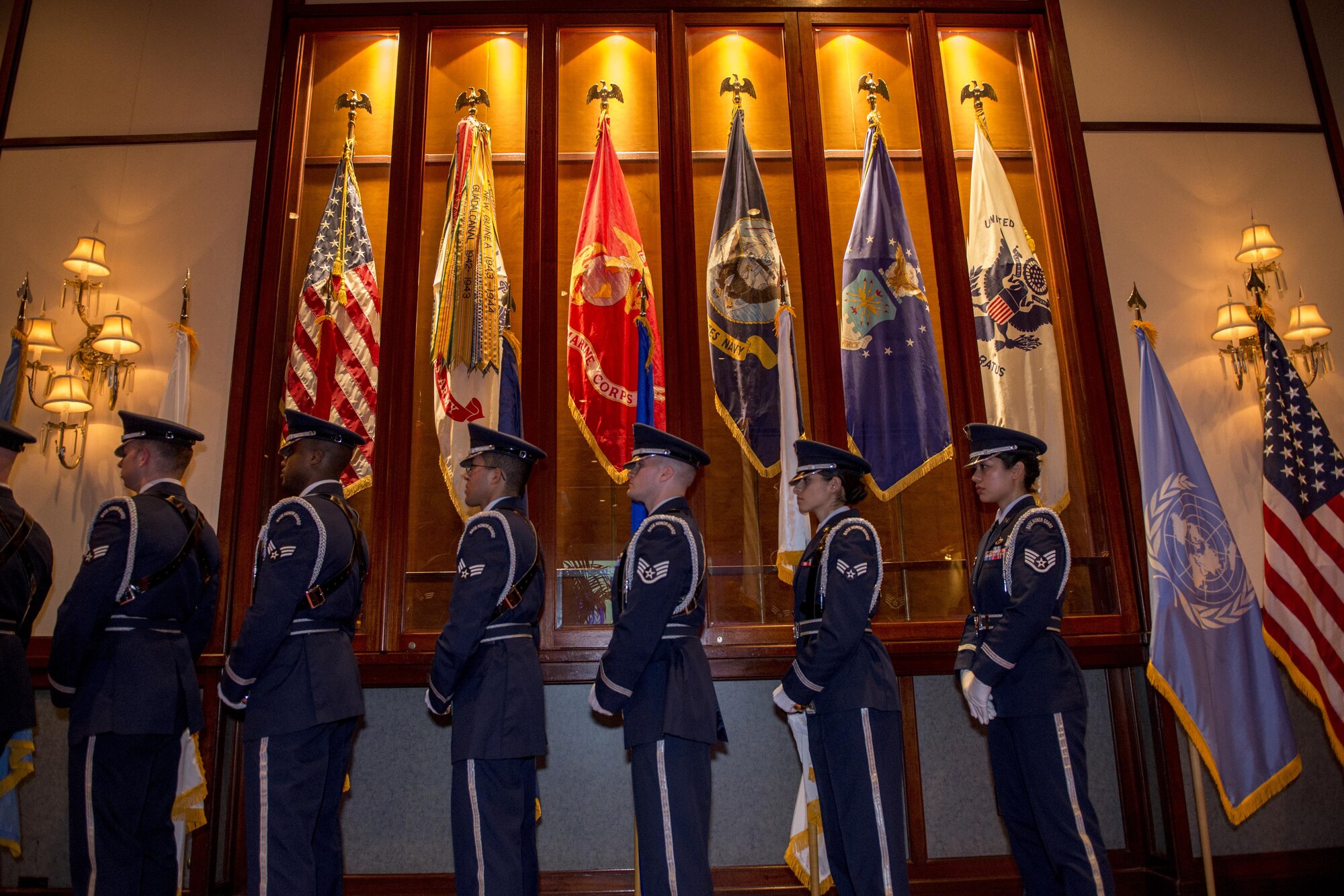 Members of the Yokota Air Base Honor Guard prepare to present the colors during the United Nations Day 71st Anniversary Celebration in Tokyo, Japan, Nov. 21, 2016. United Nations Day commemorates the anniversary of the United Nations Charter in 1945 and has been celebrated as UN Day since 1948. (U.S. Air Force photo by Airman 1st Class Donald Hudson/Released)