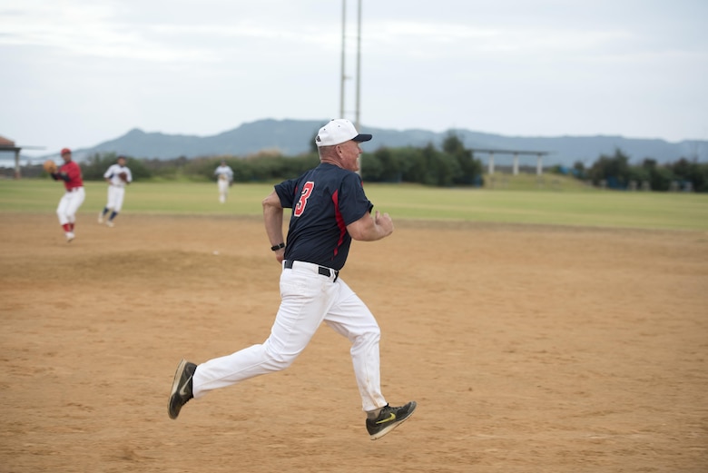 U.S. Marine Corps Lt. Gen. Lawrence D. Nicholson, III Marine Expeditionary Force commanding general, dashes for first base during a baseball game Nov. 19, 2016, at a baseball field in Naha, Japan. The Allstars are a team made up of U.S. Consulate and senior military leaders stationed on Okinawa. (U.S. Air Force photo by Senior Airman Omari Bernard/Released)
