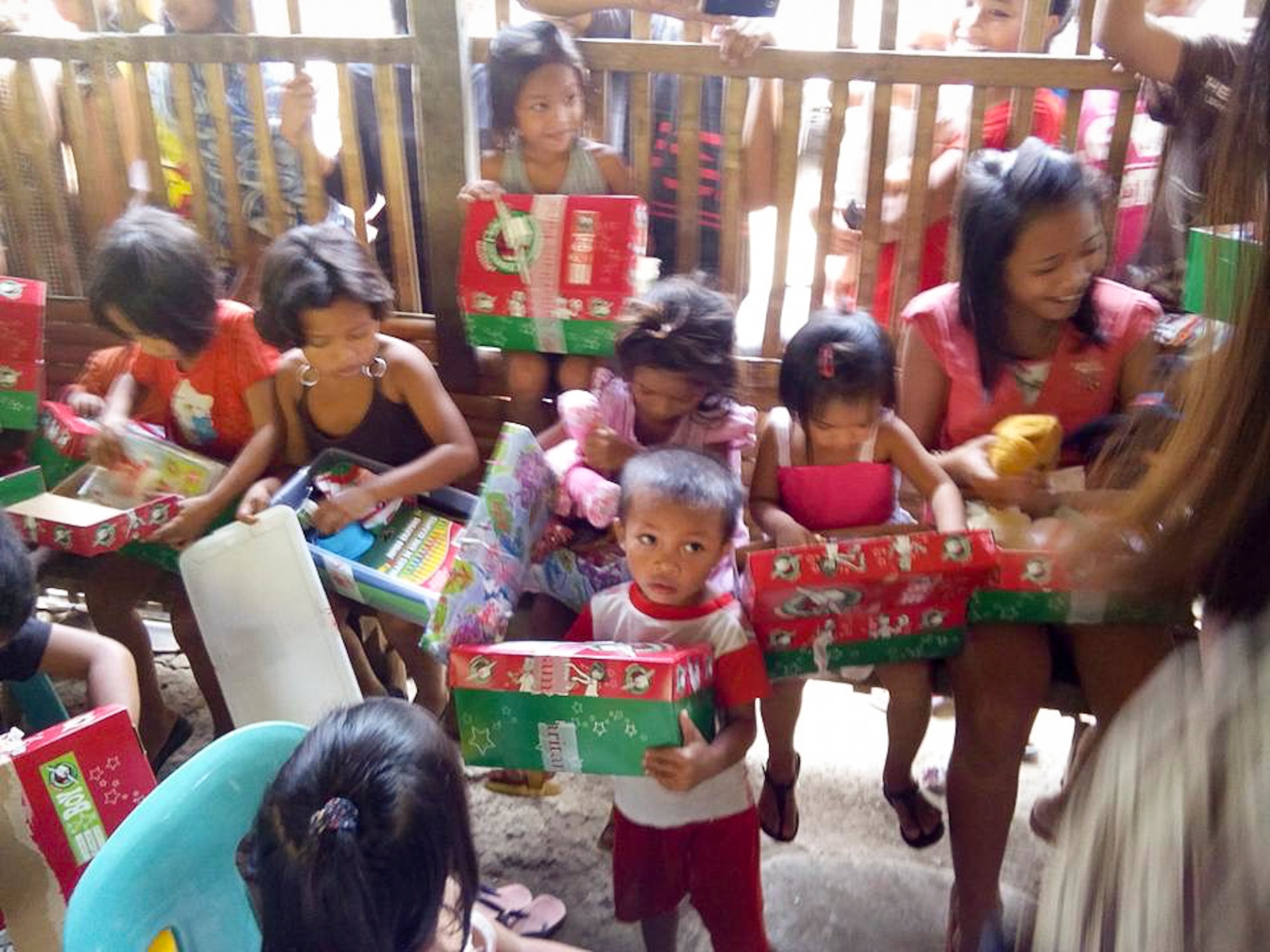 Filipino children receive Christmas gifts from donors through Operation Christmas Child. (Courtesy photo)