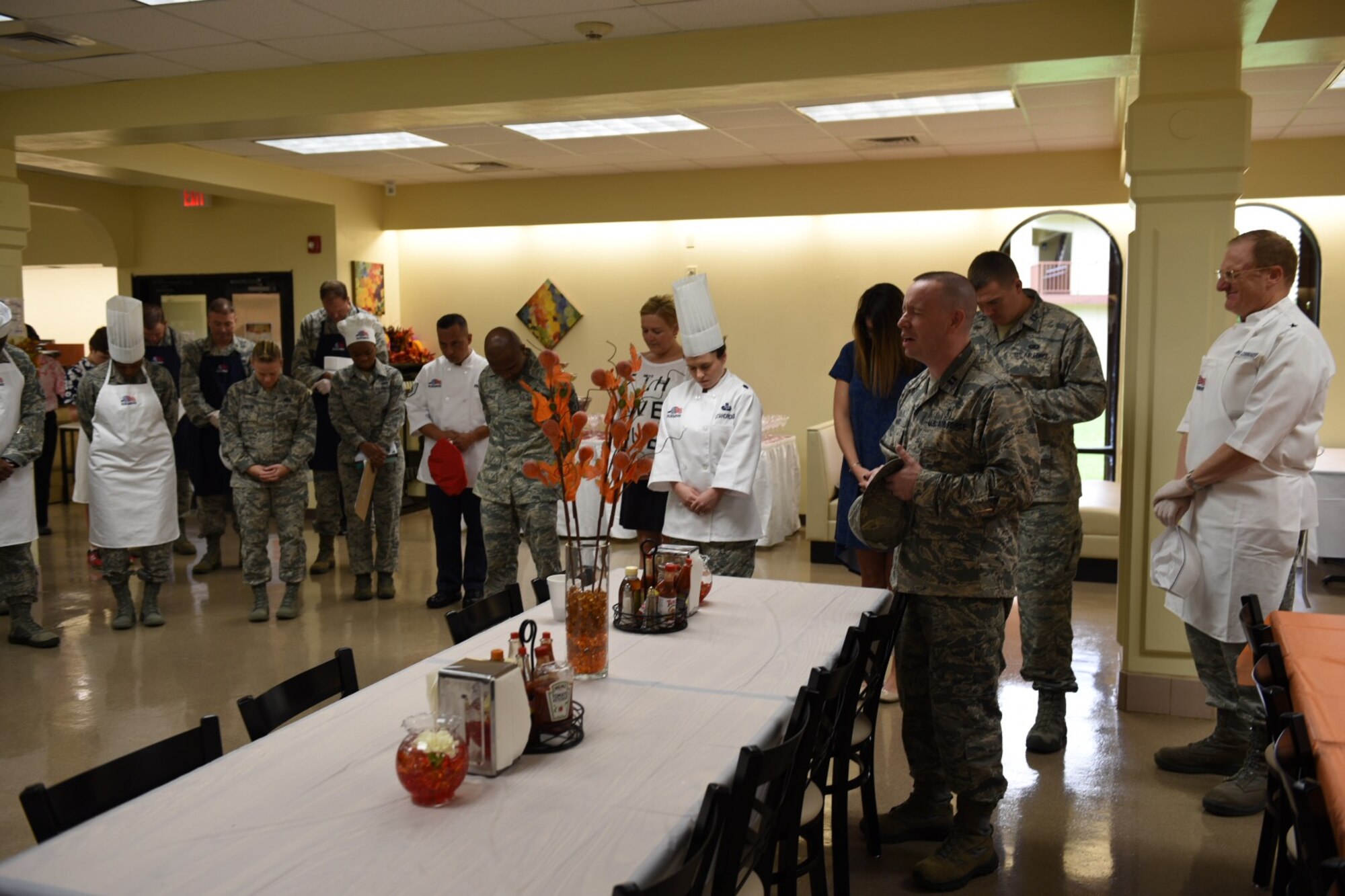 U.S. Air Force 36th Wing leadership serve Airmen Thanksgiving meals at the Magellan Inn dining facility Nov. 24, 2016, at Andersen Air Force Base, Guam. The annual event, held in the dining facility, brings service members together to eat and have a traditional Thanksgiving meal away from home with friends and family. (U.S. Air Force photo by Airman 1st Class Jacob Skovo)