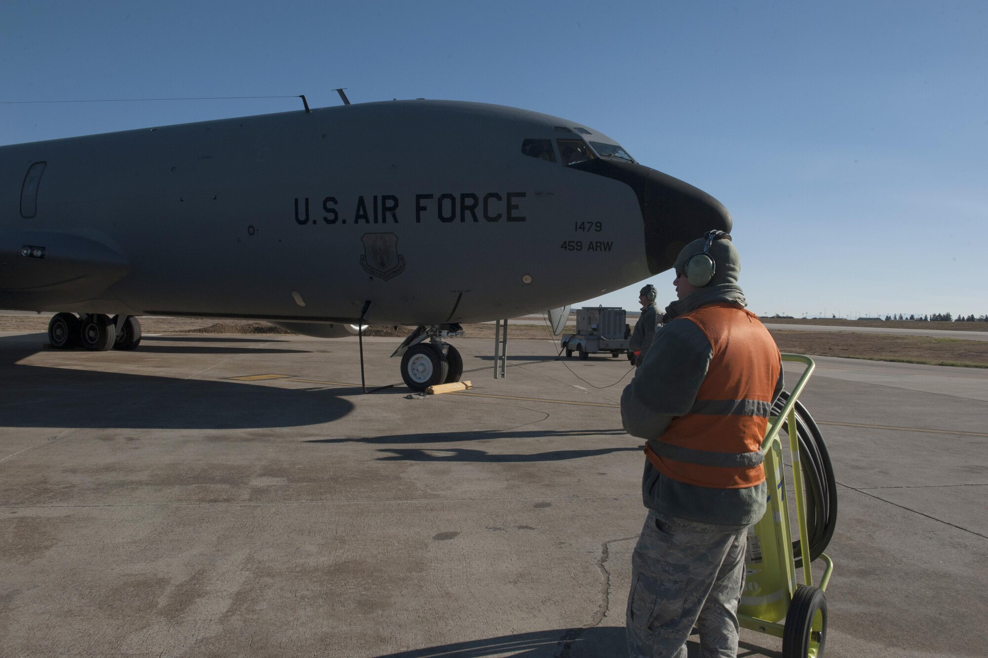 U.S. Air Force Staff Sgt. Brian (front) and Staff Sgt. Houston, 447th Expeditionary Aircraft Maintenance Squadron crew chiefs, perform initial preflight checks on a KC-135 Stratotanker Nov. 2, 2016, at Incirlik Air Base, Turkey.  Preflight checks allow for air and ground crews to ensure there are no issues with the aircraft before flight. (U.S. Air Force photo by Staff Sgt. Jack Sanders)