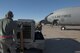 U.S. Air Force Staff Sgt. Houston (left) and Staff Sgt. Brian, 447th Expeditionary Aircraft Maintenance Squadron crew chiefs, push aerospace ground support equipment away from a KC-135 Stratotanker Nov. 2, 2016, at Incirlik Air Base, Turkey. The Stratotanker is responsible for primary aerial refueling capabilities for the U.S. Air Force. (U.S. Air Force photo by Staff Sgt. Jack Sanders)