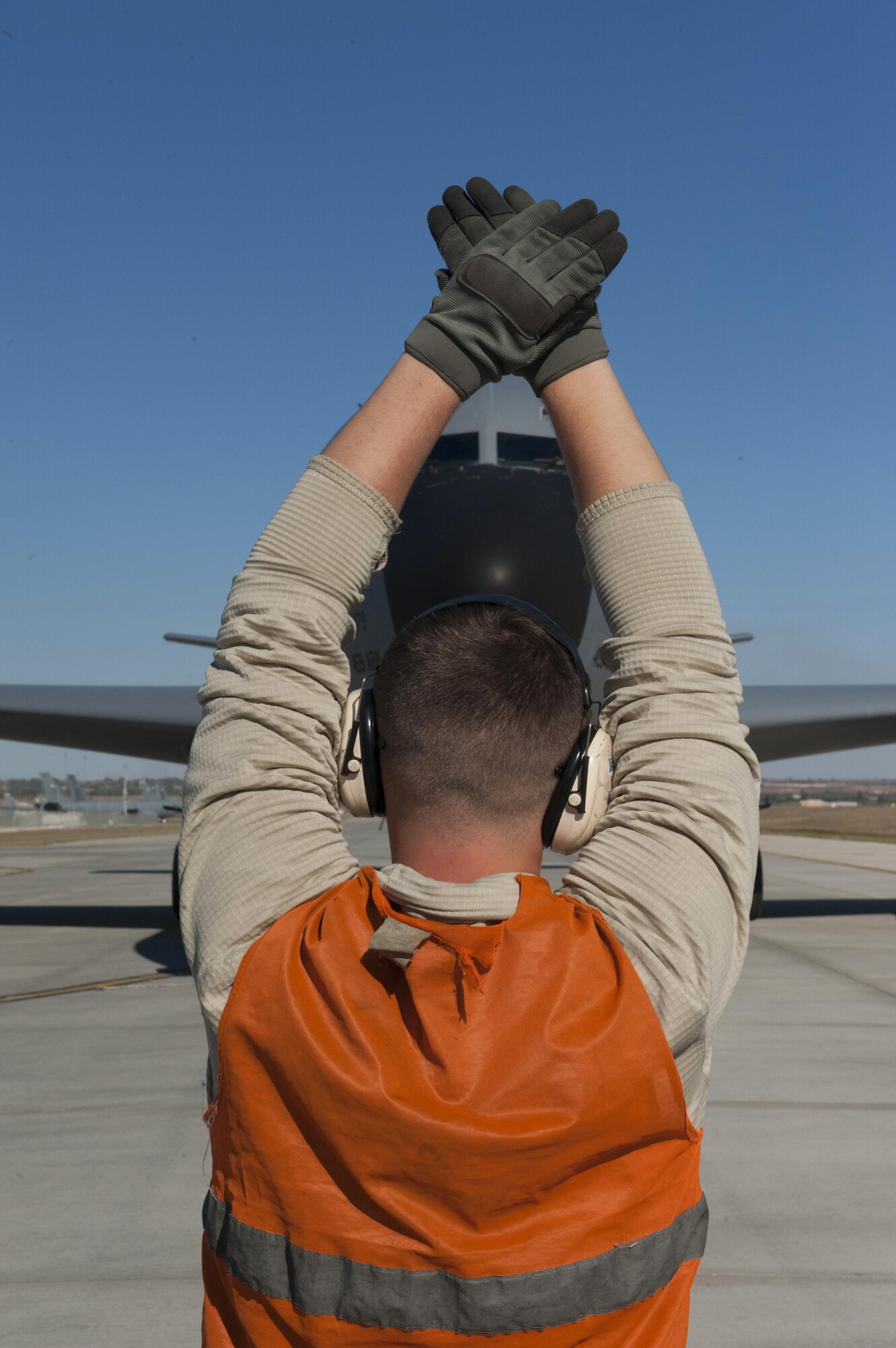 U.S. Air Force Airman 1st Class Nathaniel, 447th Expeditionary Aircraft Maintenance Squadron crew chief, marshals a KC-135 Stratotanker Nov. 2, 2016, at Incirlik Air Base, Turkey. Stratotankers provide a critical role in Operation INHERENT RESOLVE by refueling coalition forces aircraft. (U.S. Air Force photo by Staff Sgt. Jack Sanders)