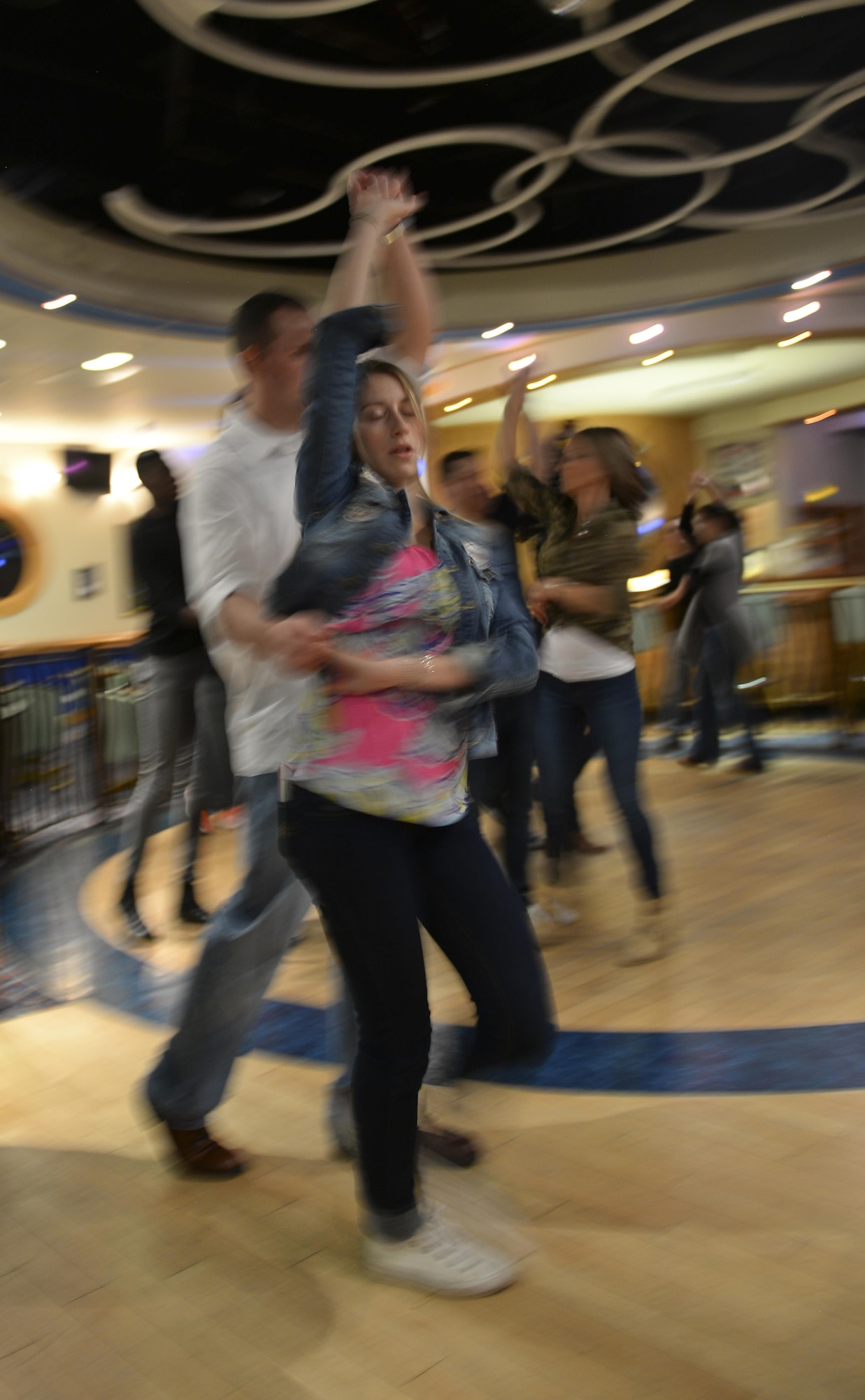 Participants from the Lively Latin Dance Class practice their moves Nov. 18, 2016, on RAF Mildenhall, England. The sessions provided a relaxed, all-inclusive opportunity for individuals and couples to learn the basics of Latin dance. (U.S. Air Force photo by Staff Sgt. Micaiah Anthony)