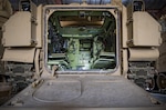 A Bradley Fighting Vehicle is prepositioned inside a warehouse maintained by the 401st Army Field Support Brigade on Oct. 21, 2016 at Camp Arifjan, Kuwait. This vehicle is part of the thousands of prepositioned, combat-ready equipment and material at Camp Arifjan to support unified-land operations all over the U.S. Central Command area of operations. (U.S. Army photo by Sgt. Angela Lorden)