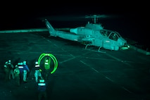 A U.S. Marine Corps AH-1W Super Cobra helicopter, from the 22nd Marine Expeditionary Unit (MEU), prepares to take off for an air strike during flight operations in support of Operation Odyssey Lightning (OOL) aboard the amphibious transport dock ship USS San Antonio (LPD 17), Nov. 8, 2016. OOL is an ongoing operation at the request of the Libyan Government of National Accord (GNA), the United States military conducted precision air strikes against Daesh targets in Sirte, Libya, to support GNA-affiliated forces seeking to defeat Daesh in its primary stronghold in Libya. (U.S. Navy photo by Petty Officer 2nd Class Adam Austin)