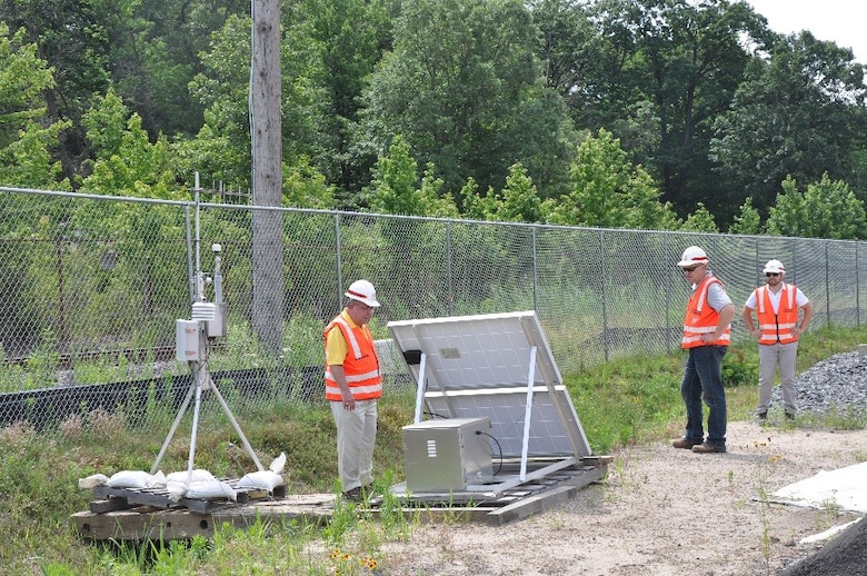 Gene Urbanik, New Jersey Area Engineer for the U.S. Army Corps of Engineers, New York District, checks air-monitoring equipment at the Horseshoe Road Superfund site in Sayreville, NJ, as colleagues look on. The District’s New Jersey Area Environmental Residency manages remediation of Superfund sites on behalf of the U.S. Environmental Protection Agency. (Photo: James D’Ambrosio, Public Affairs Specialist, U.S. Army Corps of Engineers, NY District.)