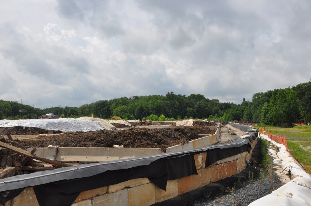 Contaminated soil removed from the six-acre Superfund site in Sayreville, NJ, dries out in a contained area to reduce its weight before being transported off site by rail to a certified landfill for safe disposal. Removing contaminants from soil and ground water is a complex process that can take years. (Photo: James D’Ambrosio, Public Affairs Specialist, U.S. Army Corps of Engineers, NY District.)