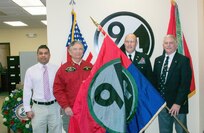 (Left to right) 94th Training Division Chief Executive Officer Vivek Kshetrapal, 94th Infantry Division Historical Society Secretary John Clyburn, 94th Training Division Assistant Division Commander Col. John Aarsen, and 94th IDHS Immediate Past President Bill Van Sant participate in the flag transfer held at Fort Lee, Virginia, Nov. 21, 2016. The 94th IDHS passed their World War II colors to the current 94th Training Division at the division's headquarters.
