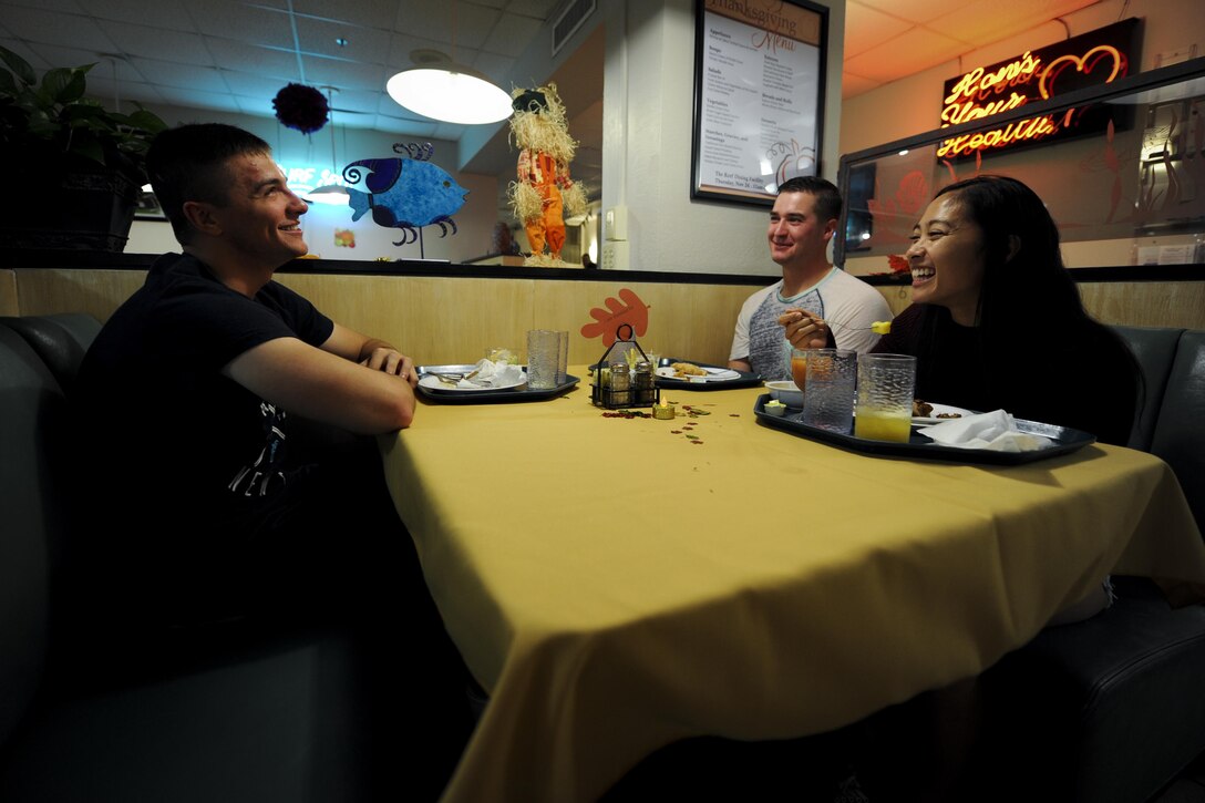 Air Commandos enjoy a Thanksgiving meal prepared by Reef Dining Facility personnel at Hurlburt Field, Fla., Nov. 24, 2016. Air Force Special Operations Command and 1st Special Operations Wing leadership served Hurlburt personnel a Thanksgiving meal that included turkey, ham, roast beef, mashed potatoes, shrimp cocktail, cranberries, corn and a selection of desserts. (U.S. Air Force photo by Airman Dennis Spain)