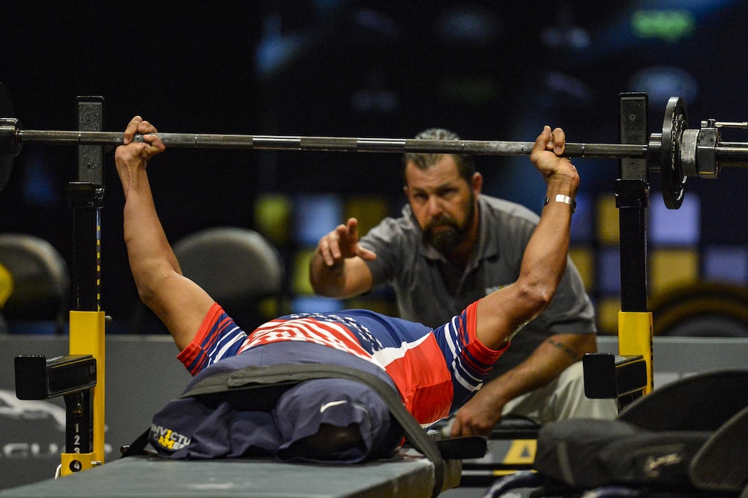 Veteran Ryan Major, a former Army sergeant, bench presses during the powerlifting competition at the Invictus Games 2016 in Orlando, Fla. May 8, 2016. The sporting event includes 14 nations with over 500 military athletes. Air Force photo by Tech. Sgt. Joshua L. DeMotts


