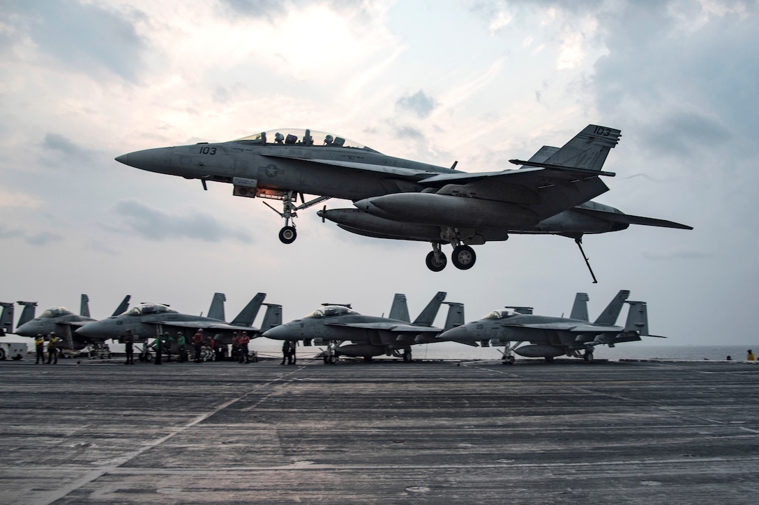 An F/A-18 F Super Hornet prepares to make an arrested landing on the flight deck of the aircraft carrier USS Dwight D. Eisenhower in the Persian Gulf, Nov. 24, 2016. Navy photo by Petty Officer 3rd Class Anderson Branch