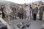 Republic of Korea (ROK) Minister of National Defense Han Min-koo joins the Combined Forces Command Commander Gen. Vincent K. Brooks and the Combined Forces Command Deputy Commander Gen. Leem Ho-young during a readiness inspection and observes the capabilities of the 2d Infantry Division, ROK/US Combined Division, Nov. 29, 2016. “It is always great to have the Minister of Defense visit our Soldiers and see the ironclad ROK-U.S. Alliance in its human form. We appreciate his support and courageous leadership,” said Gen. Brooks. (U.S. Army photo by Sgt. 1st Class Sean K. Harp)