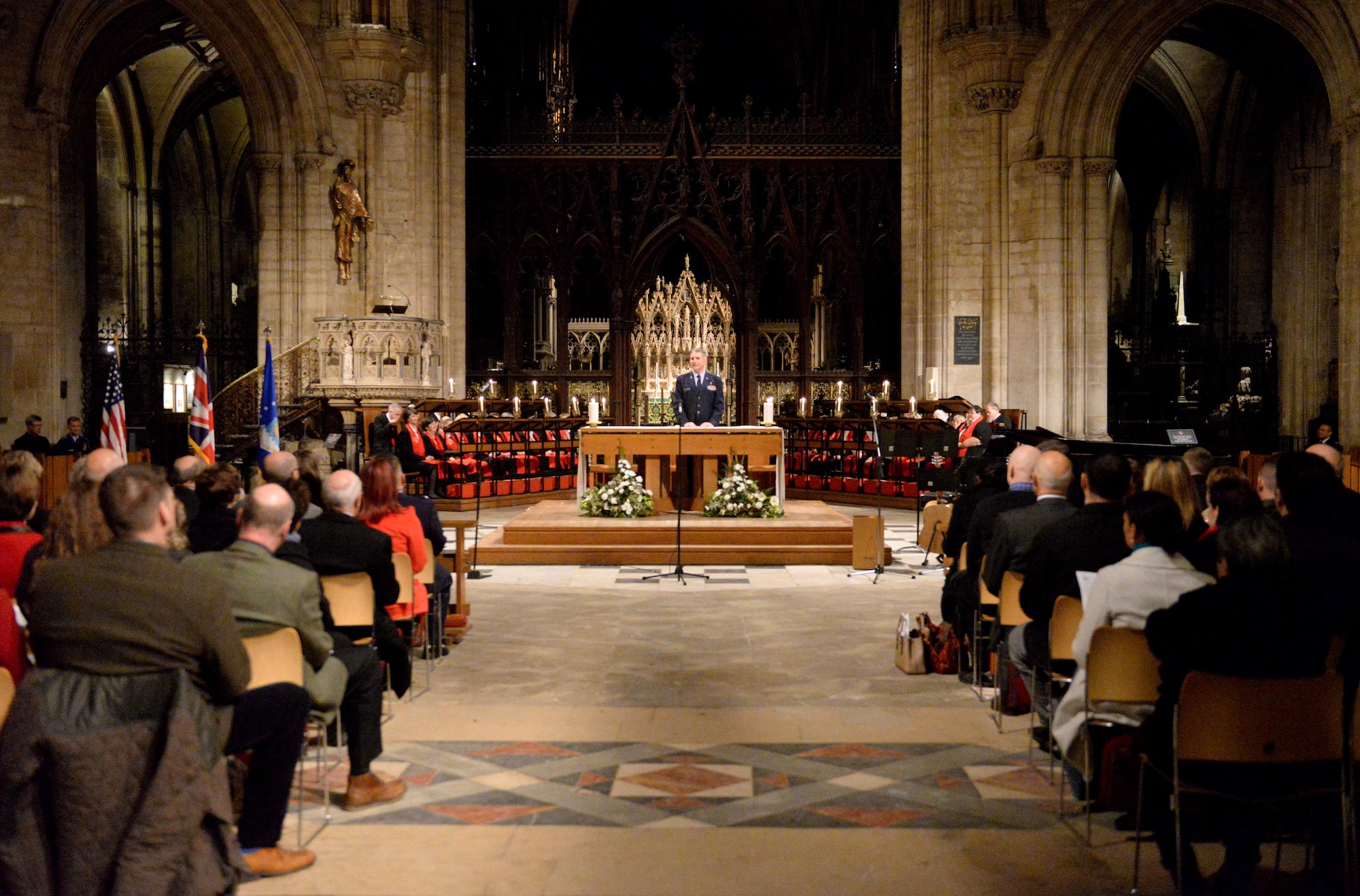 U.S. Air Force Chaplain (Lt. Col.) Timothy Porter, 100th Air Refueling Wing, begins a Thanksgiving service Nov. 23, 2016, at the Ely Cathedral in Ely, England. Although England doesn’t celebrate Thanksgiving, Ely Cathedral opens its 900-year-old doors every year to provide U.S. military personnel and local community members a place to celebrate, worship and give thanks. (U.S. Air Force photo by Staff Sgt. Kate Thornton)